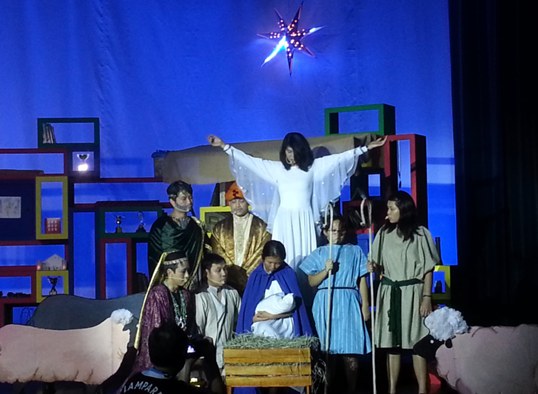 Cast on stage at a Christmas Evangelistic Musical